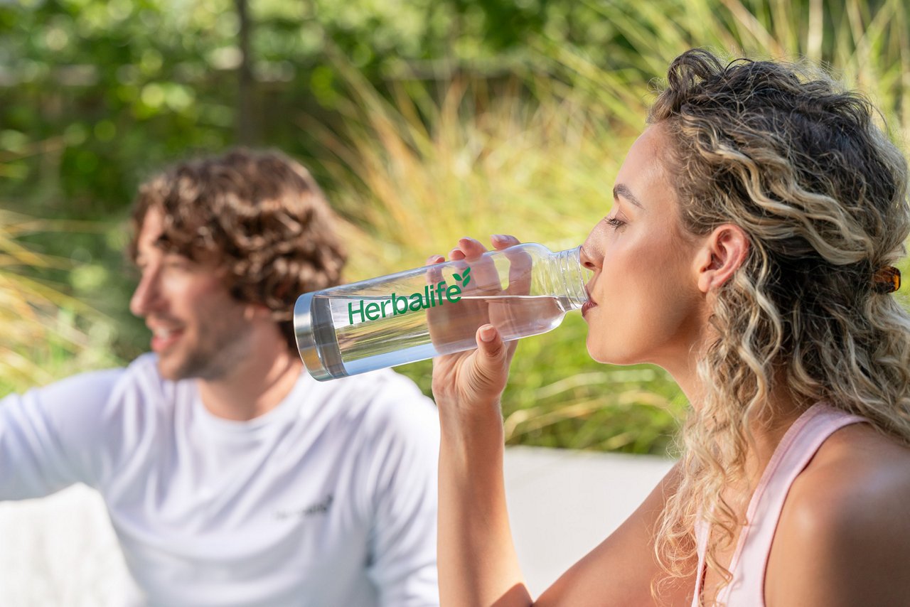 Woman drinking water Woman drinking water